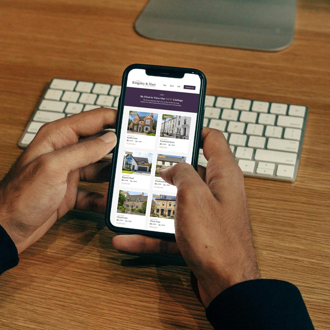 Property website displayed on a mobile phone showing available homes